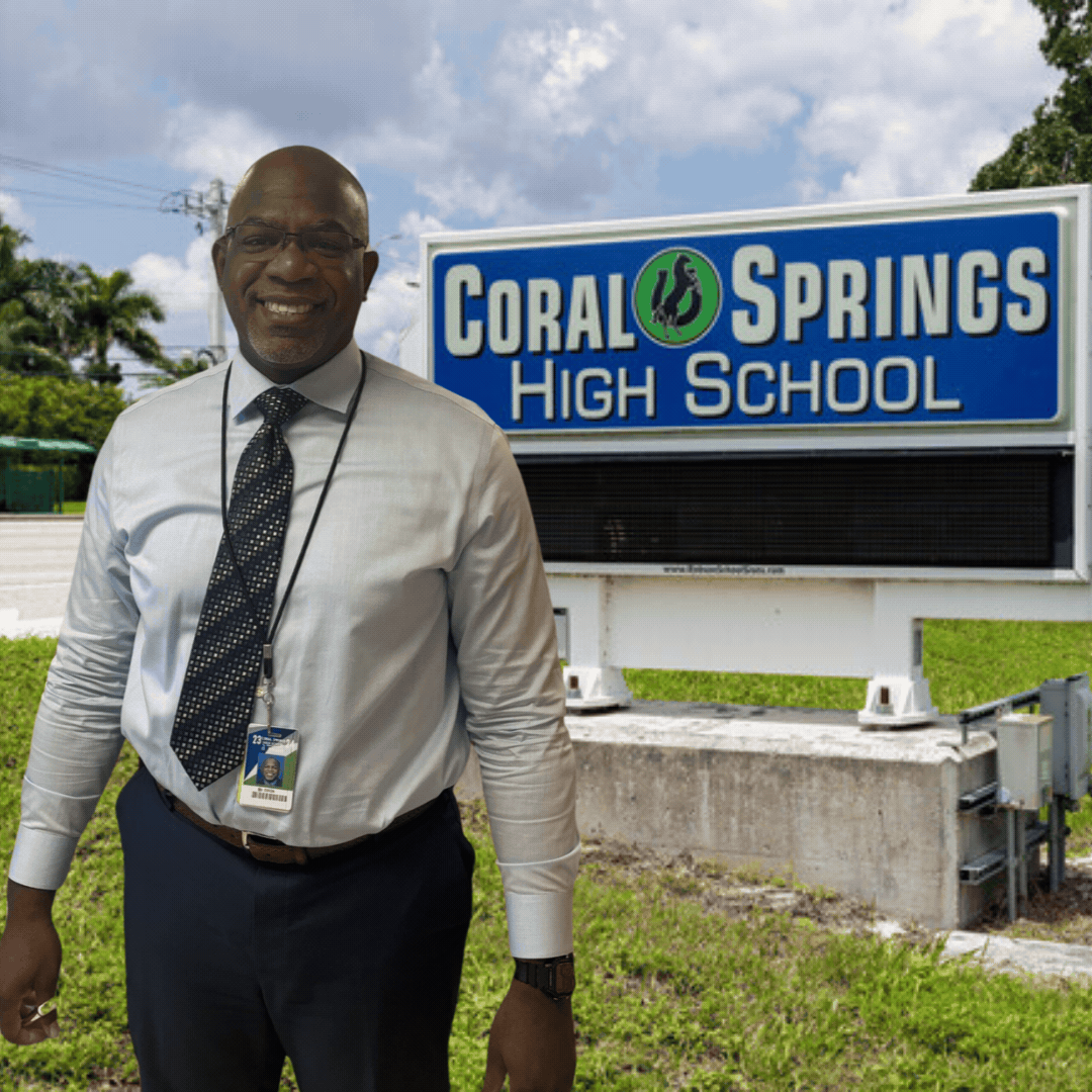 Mr. Dixon placed in front of the Coral Springs HS announcement marquee. 